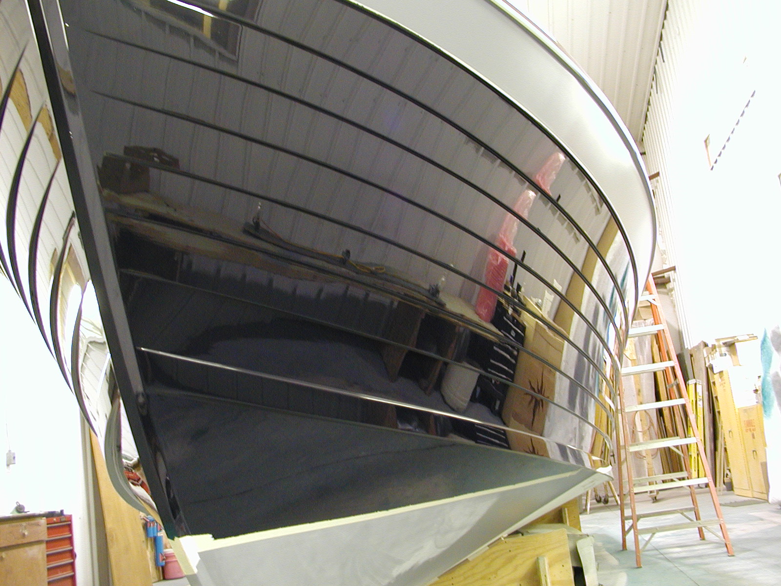 Hull being painted in paint bay on Chocolate Chip 3